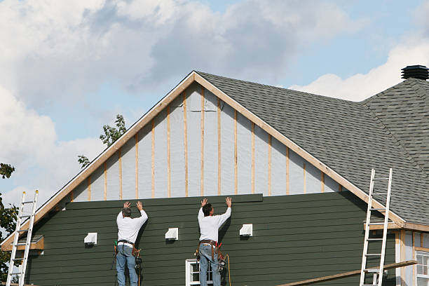 Professional Storm Damage Siding Repair technician working in Mooresville, IN